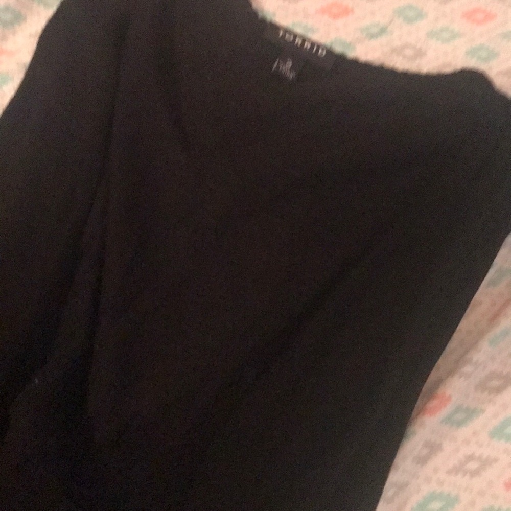 Torrid full length/long sleeveless cardigan.
